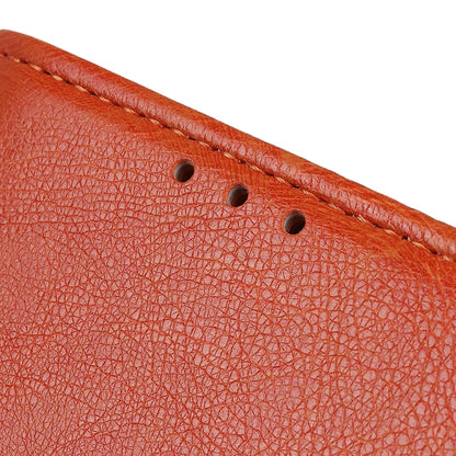 Close-up of orange textured leather flip phone case stitching and perforation