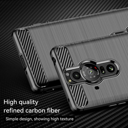 Brushed TPU phone case with carbon-fiber corner panels and raised camera protection