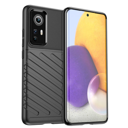 Black shockproof TPU phone case with textured grip for Xiaomi 12 series.