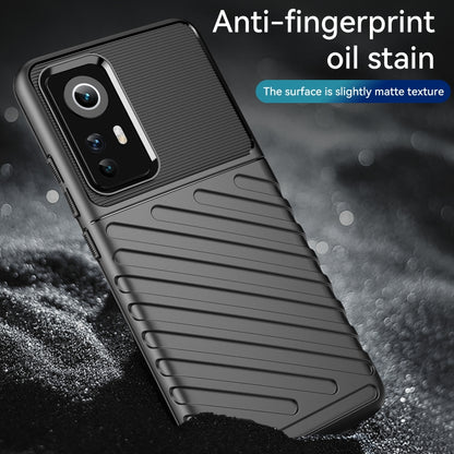 Black textured shockproof TPU phone case with matte, anti-fingerprint surface.