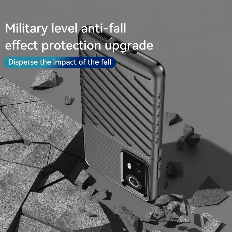 Black shockproof TPU phone case with rugged textured design for drop protection.