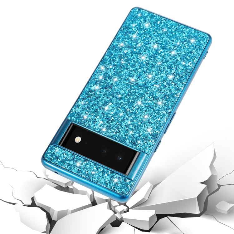 Blue glitter TPU phone case with camera cutout and shock-absorbing bumper.
