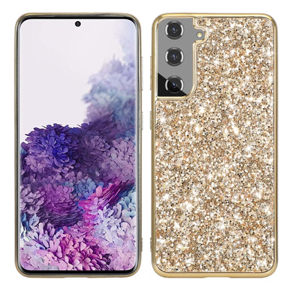 Glitter TPU phone case, gold sparkly back with camera lens and side cutouts.