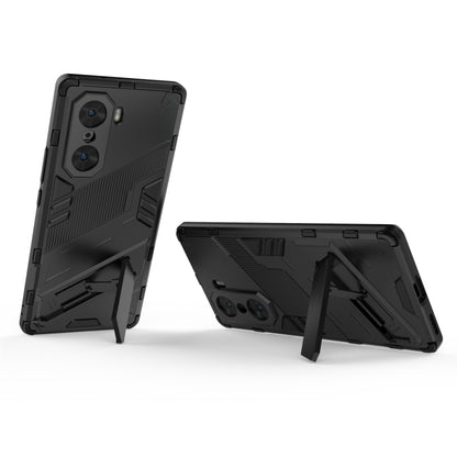 Black rugged phone case with built-in kickstand and camera-protecting back cover
