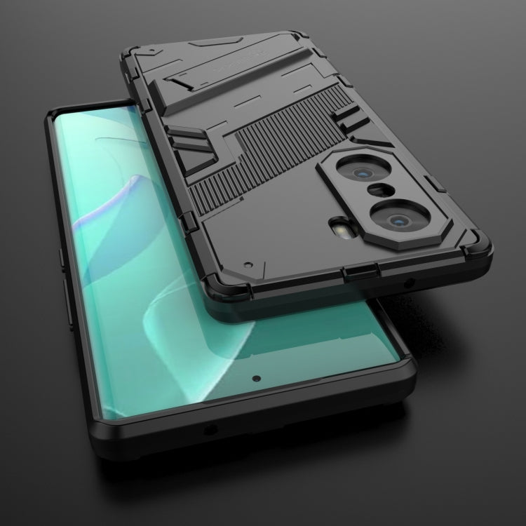 Grey rugged phone case with kickstand, shown with front cover attached