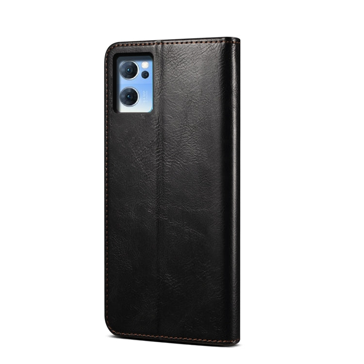 Black leather phone case with camera cutout and textured finish