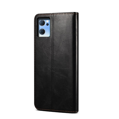 Black leather phone case with camera cutout and textured finish