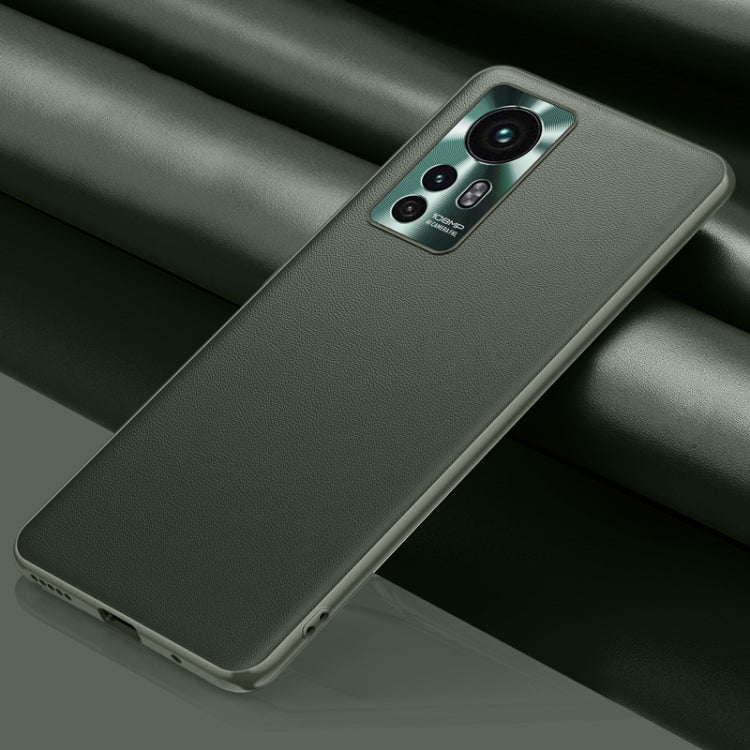Green leather phone case with camera cutout and raised edges for secure protection