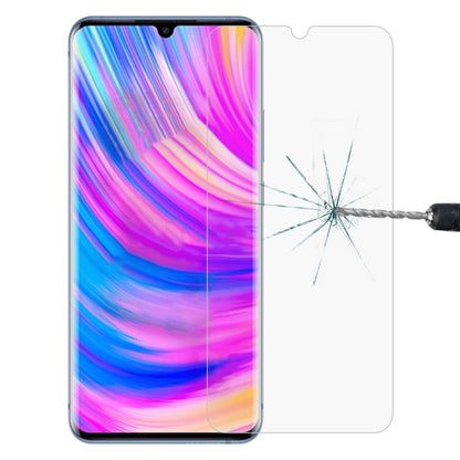 Clear tempered glass screen protector film covering phone screen with impact crack