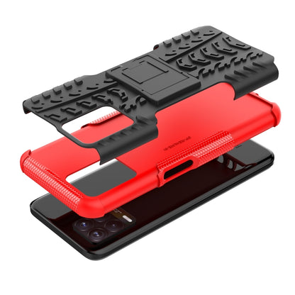Red and black tire-textured phone case with fold-out holder for screen support