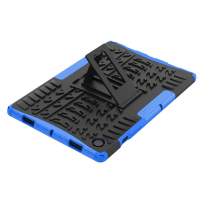 Blue and black rugged tablet case with tire-tread texture and fold-out stand
