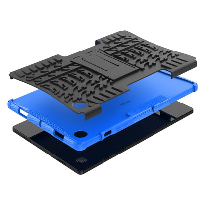 Blue tablet case with dark tire-tread top cover and flip kickstand
