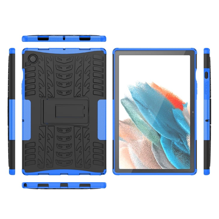 Rugged blue tablet case shown in multiple pieces with tire-tread back panel