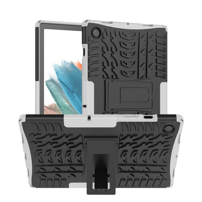 Gray and black rugged tablet case with tire-tread texture and kickstand