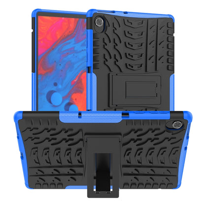 Blue and black rugged tablet case with tire-tread texture and kickstand