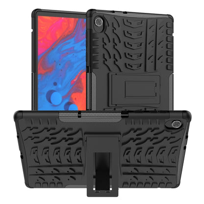 Black tablet case with textured TPU shell, built-in stand, and camera cutout