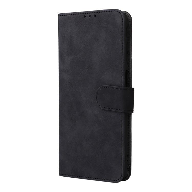 Black magnetic flip leather phone case with stitched folio front and snap closure