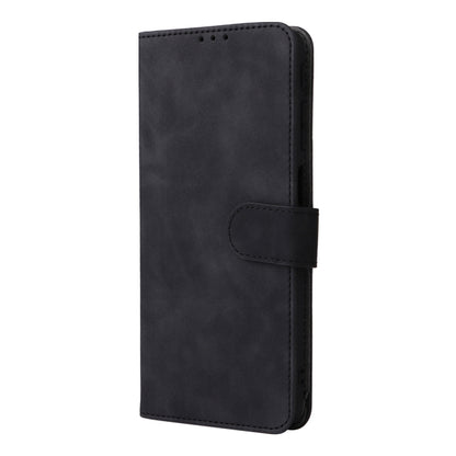 Black magnetic flip leather phone case with stitched folio front and snap closure