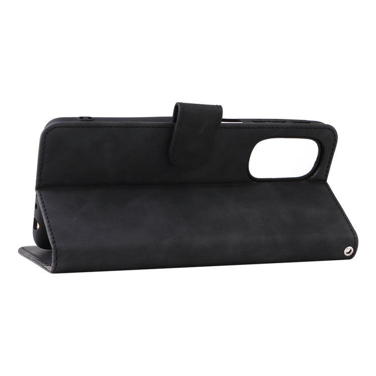 Black magnetic flip leather phone case with stand position and camera cutout