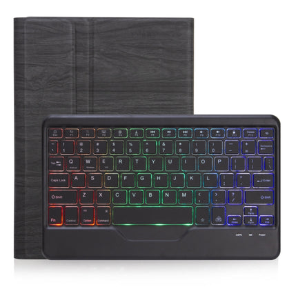 Bluetooth keyboard folio case showing tri-color backlit keys with wood-texture back cover