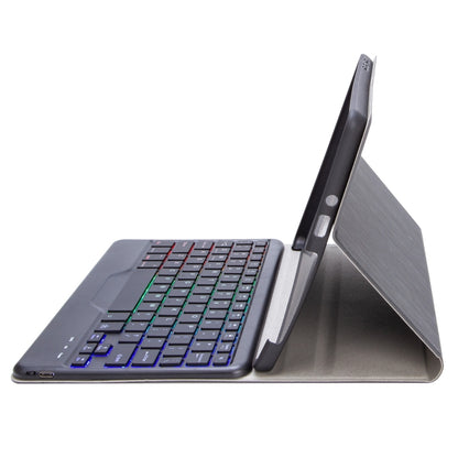 Bluetooth keyboard folio case standing on an angled base with tri-color backlit keys