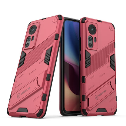 Rugged shockproof phone case with red armor pattern and camera cutouts