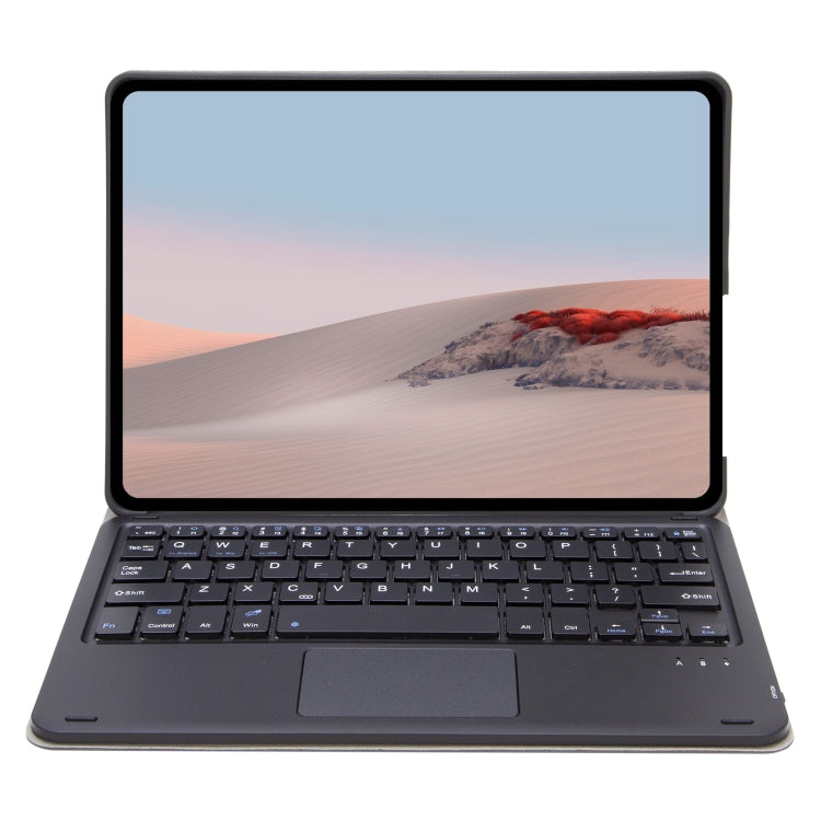 Dark gray leather keyboard case with touchpad, keyboard and screen in use