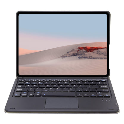 Dark gray leather keyboard case with touchpad, keyboard and screen in use