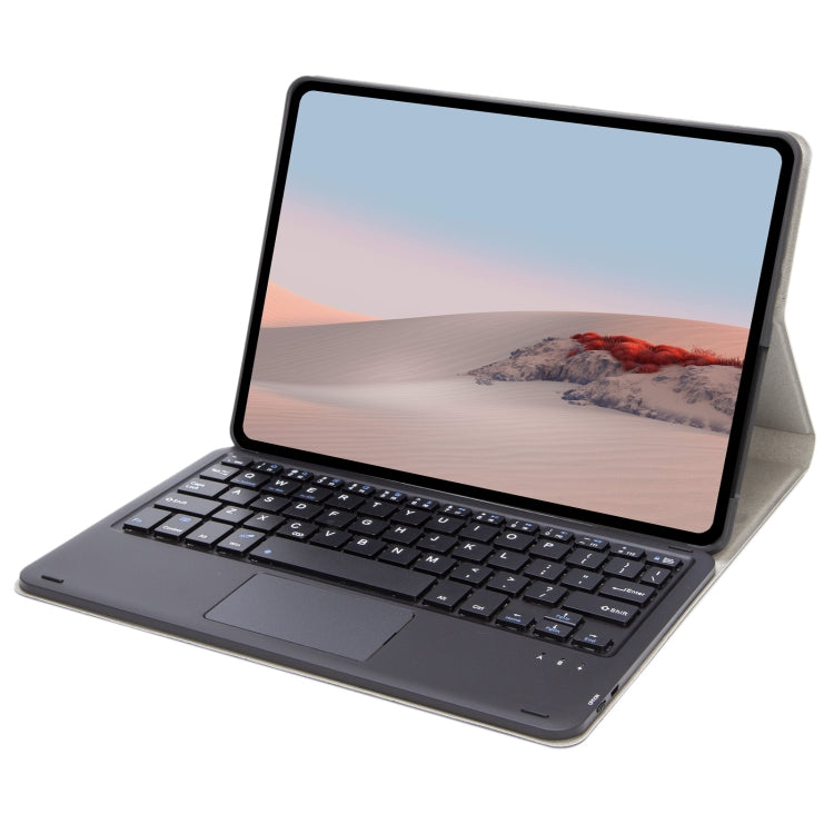 Dark gray leather keyboard case and touchpad with tablet displayed