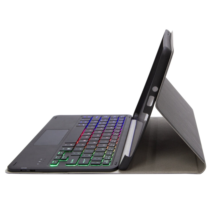 Bluetooth keyboard case with touchpad, dark wood-grain leather, angled stand, backlit keys