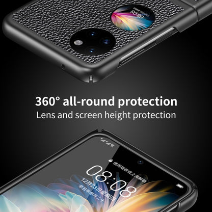 Black litchi-texture phone case with raised lens and screen protection details.