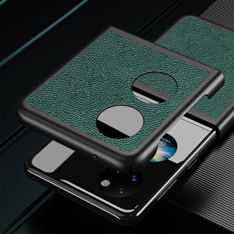 Green litchi-texture phone case with protective bumper and camera lens cutout.