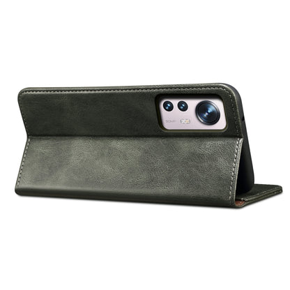 Dark green leather wallet-style phone case with camera cutout flap