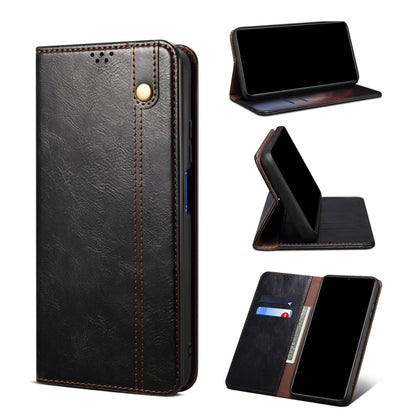 Black leather folio phone case with magnetic closure and fold-out stand
