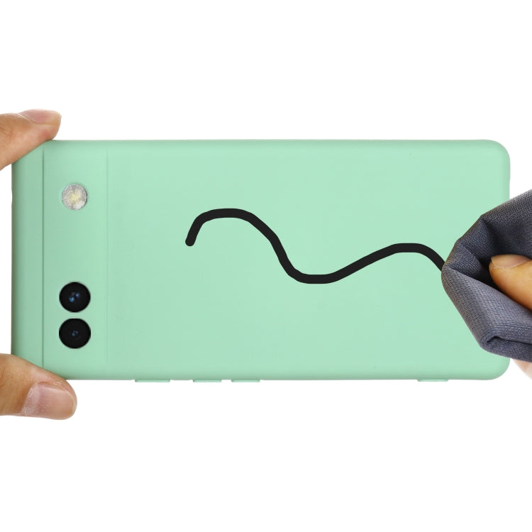 Mint green silicone phone case for Pixel 6a, side profile with camera opening