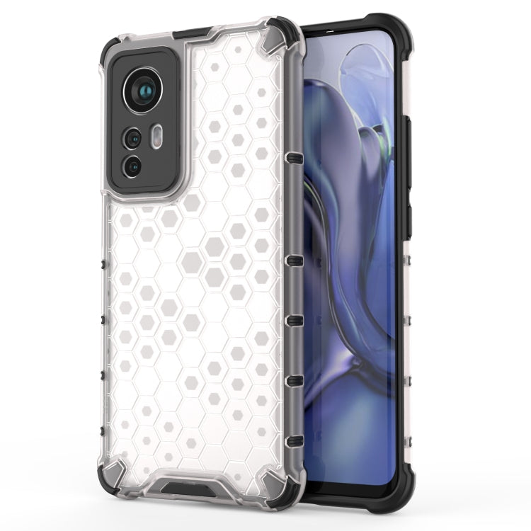 White shockproof phone case with hex honeycomb pattern and raised camera lip