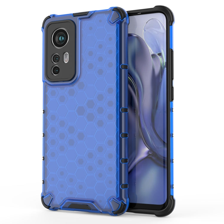 Shockproof honeycomb phone case, blue TPU edge, hex-pattern PC back