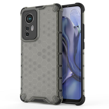 Dark gray hex honeycomb shockproof phone case with raised camera lip