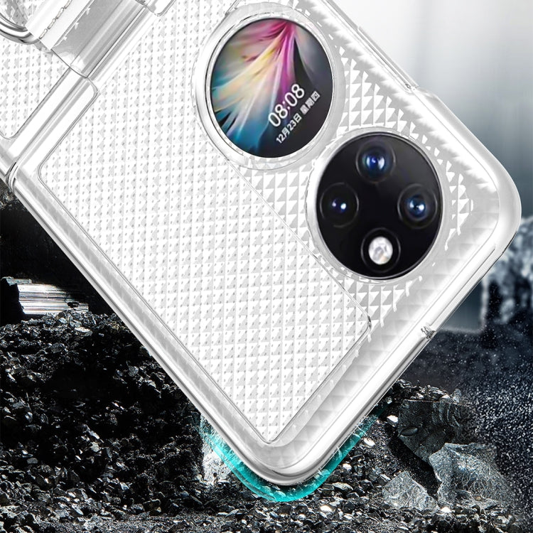 Transparent case with metal ring holder, textured diamond pattern, and triple camera opening