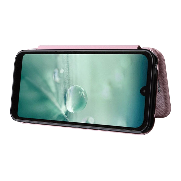 Pink magnetic flip phone case with phone screen visible behind front cover window.