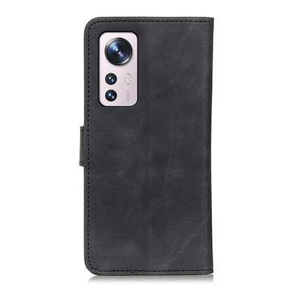 Black KHAZNEH leather phone wallet case with camera cutout.
