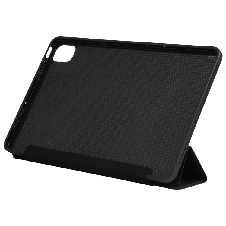 Black tablet case with textured rear and built-in stand for angled viewing