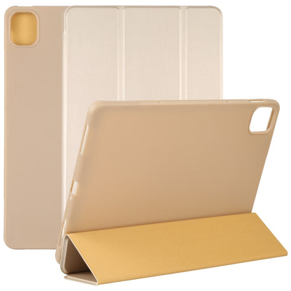 Gold/tan three-fold tablet case with stand and camera cutout on the back