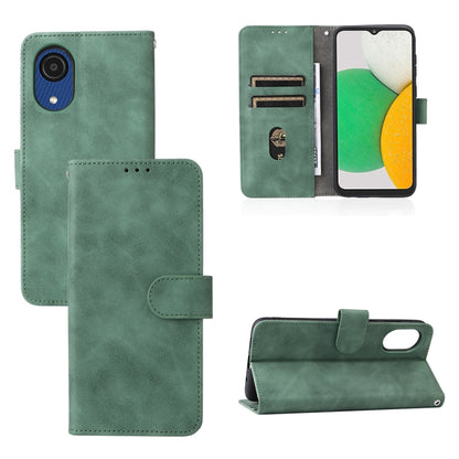 Green PU wallet phone case with magnetic buckle, card slots, and camera cutout.