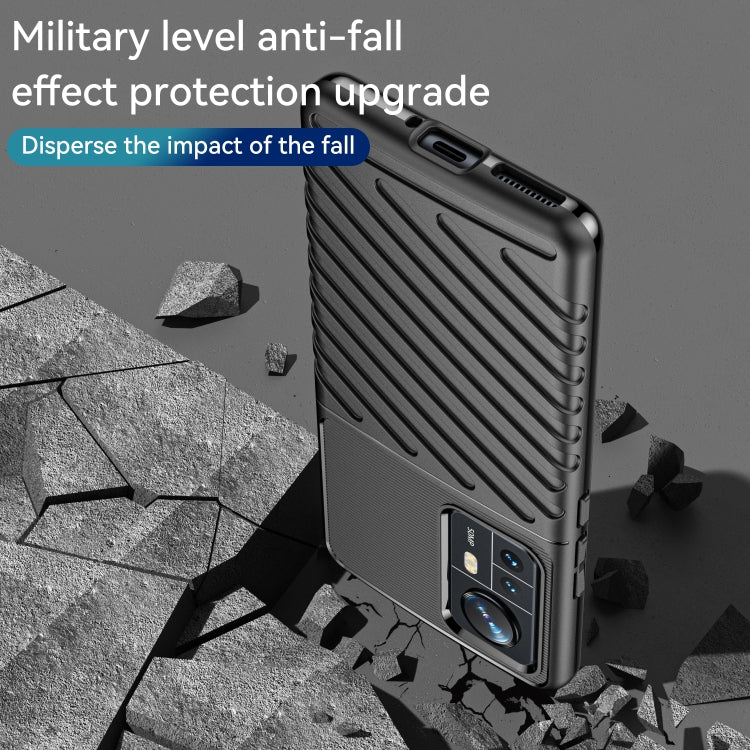 Black TPU phone case with impact-dispersing ridges and side button covers