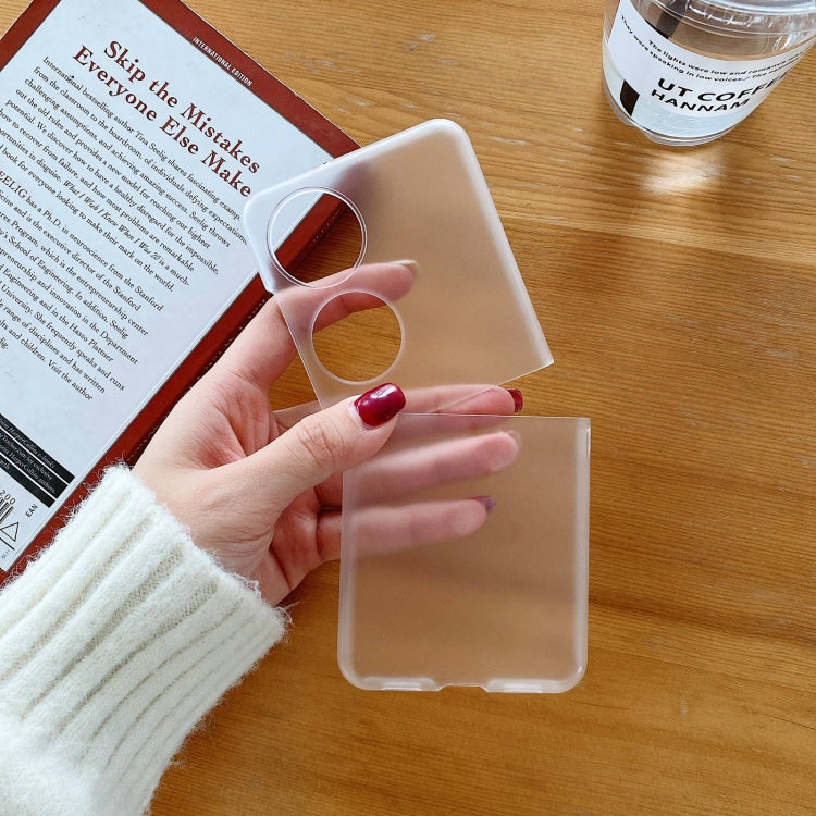 Transparent frosted PC folding phone case with two circular cutouts and top cover