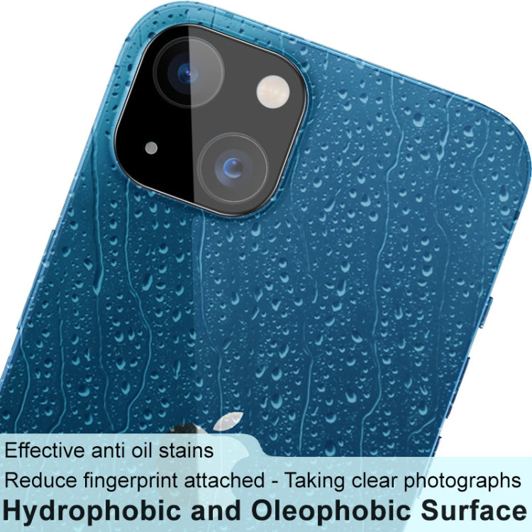 Black integrated rear camera lens tempered glass film with lens cap on blue phone back