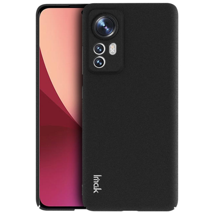 Frosted hard phone case in black for Xiaomi 12, with camera cutouts and raised edges