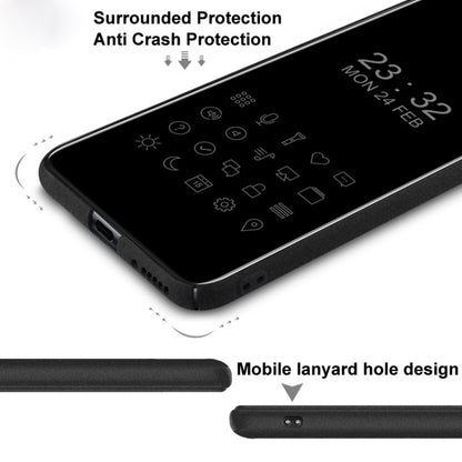 Black phone case edge with port openings and a small lanyard hole near the bottom