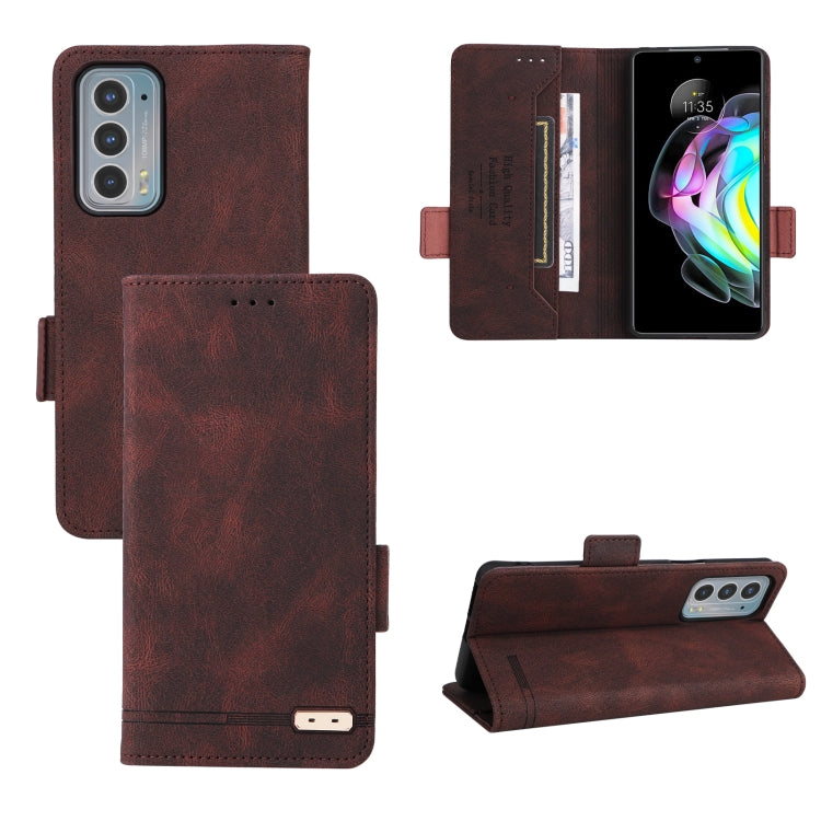 Brown leather folio phone case with magnetic clasp, card slots, and cutouts for camera